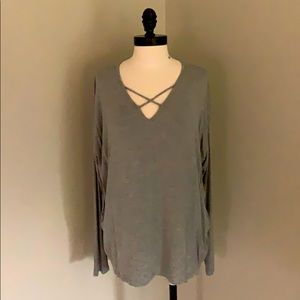 Grey long sleeve top with cris cross design